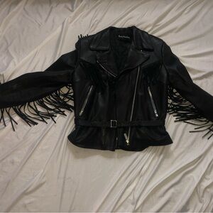 Harley Davidson, woman’s fringe jacket, leather